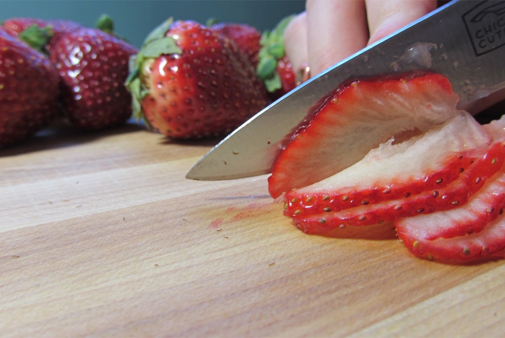 Cut thin strawberry slices