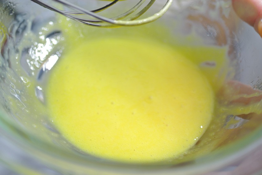 Whisk egg yolks