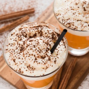 Sugar-free pumpkin cocktail with cinnamon and cream